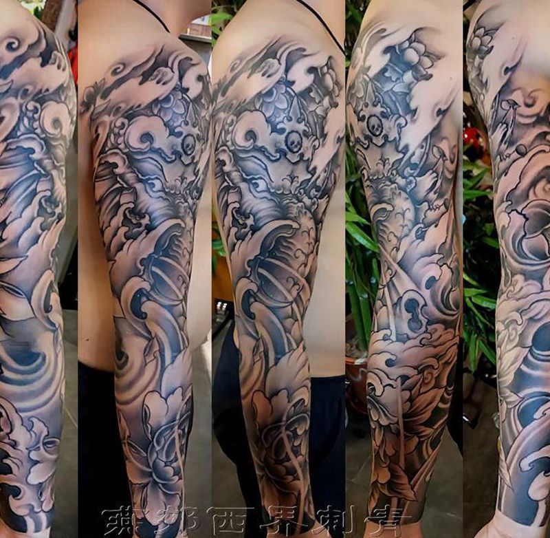 新传统花臂纹身图片_手臂新传统纹身图案