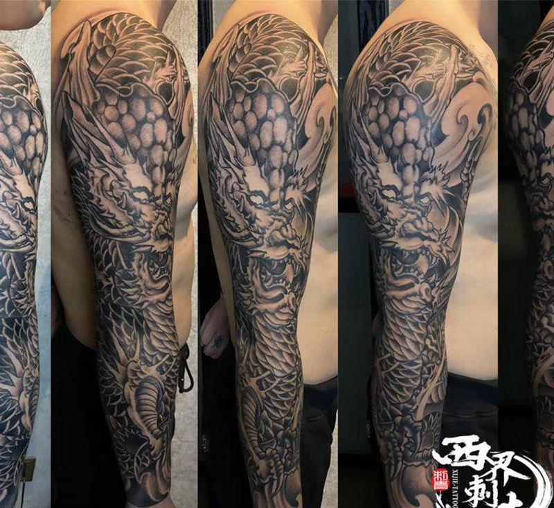 新传统花臂龙纹身图片_手臂新传统纹身图案