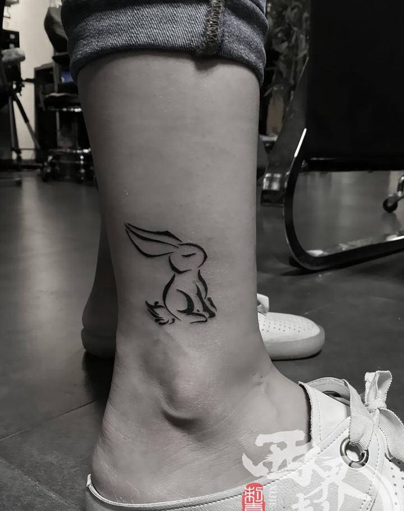 小腿兔子图腾纹身图片_脚部腿部新传统图腾纹身图案