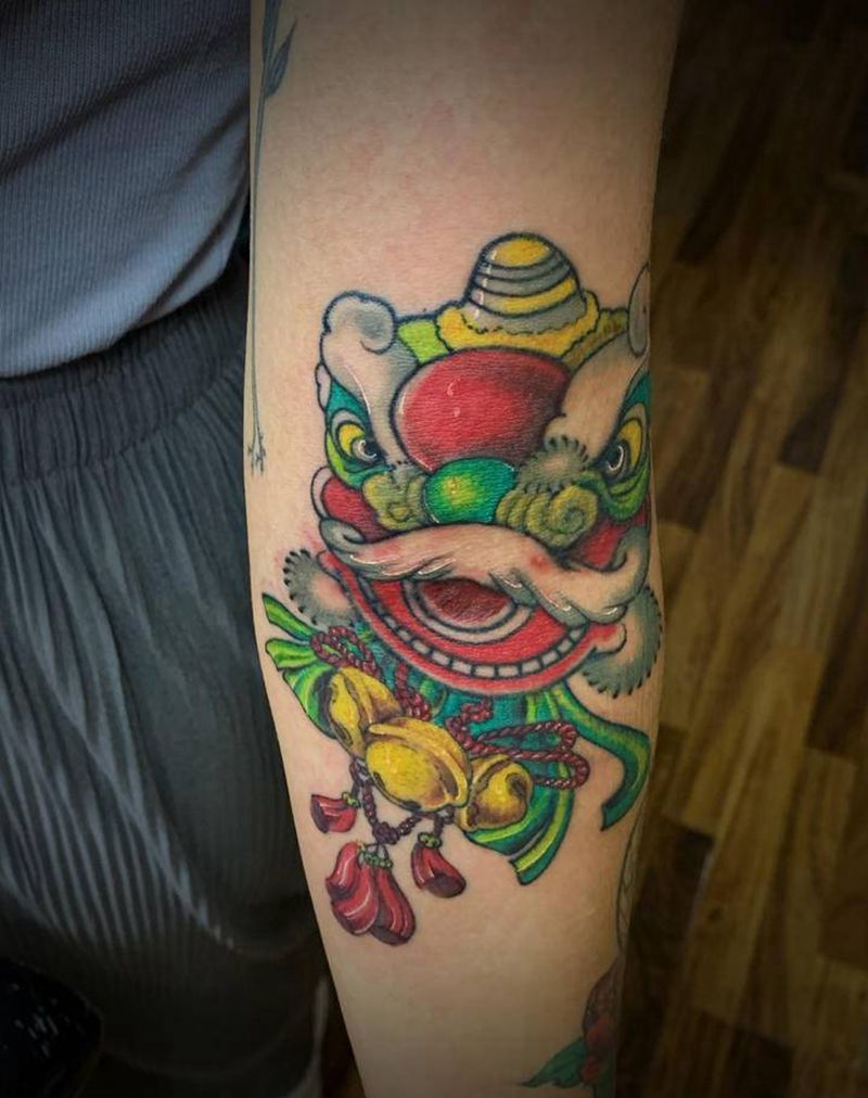 唐狮纹身图片_手臂新传统New School唐狮铃铛纹身图案