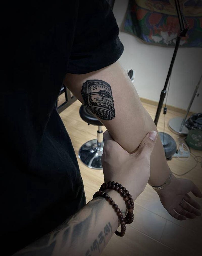 美钞纹身图片_手臂纹身图案