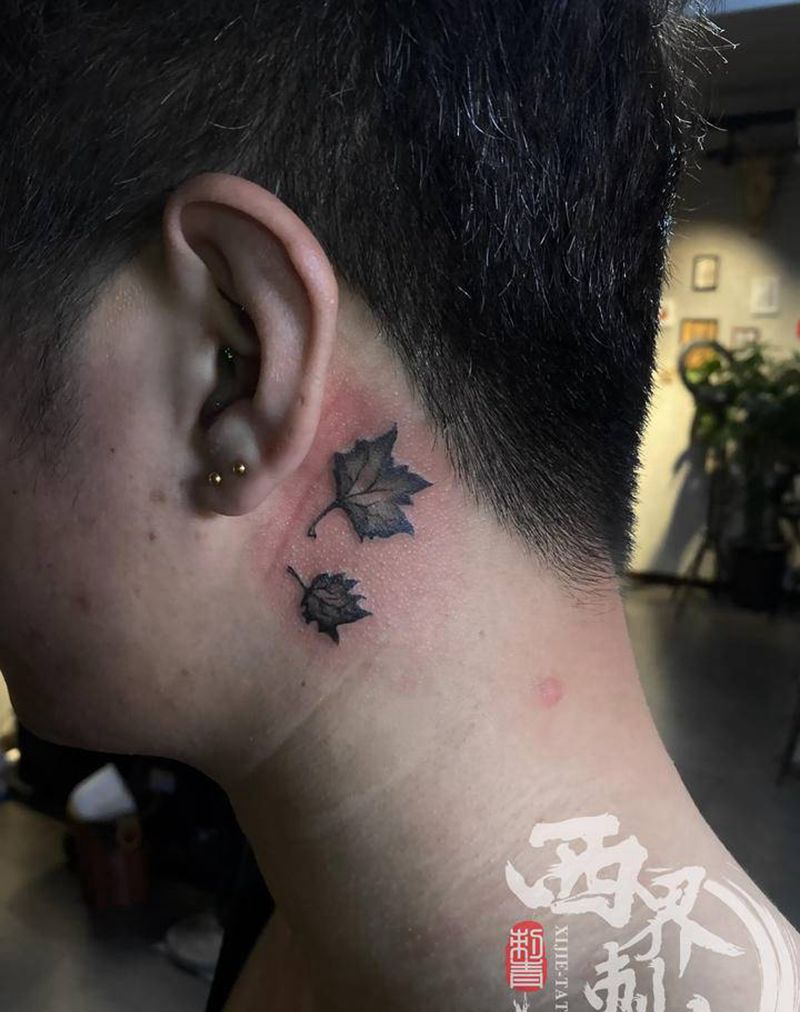耳后枫叶纹身图片_颈部水墨点刺纹身图案