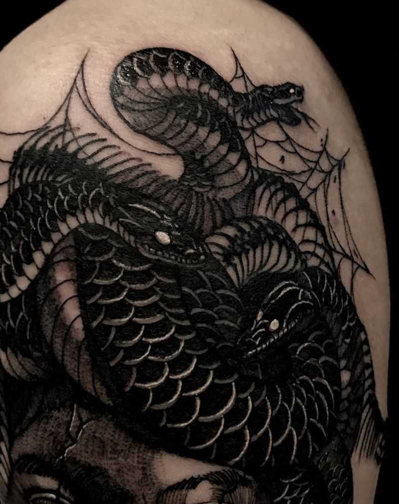 石雕美杜莎纹身图片_手臂点刺纹身图案