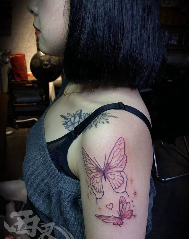 手臂蝴蝶纹身图片_手臂手部水彩新传统纹身图案