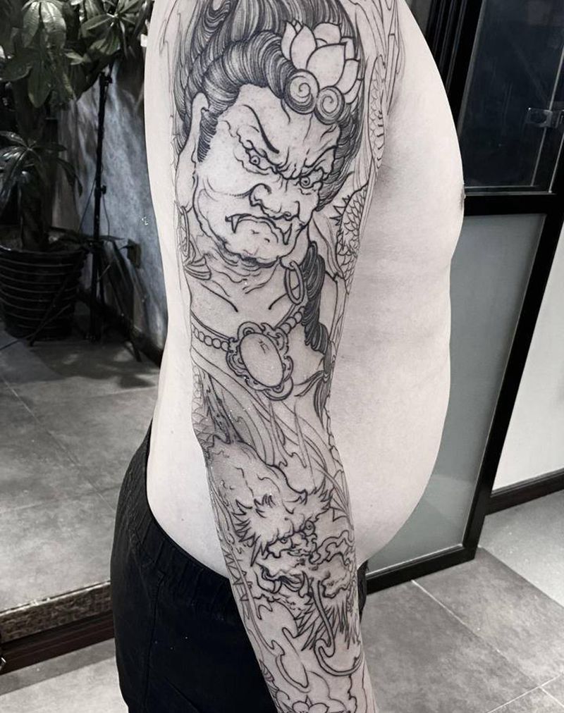 传统花臂不动明王纹身图片_手臂新传统老传统纹身图案