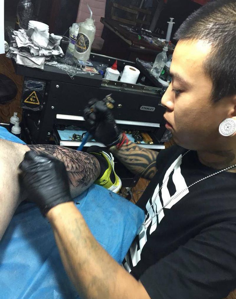 小腿鲤鱼纹身图片