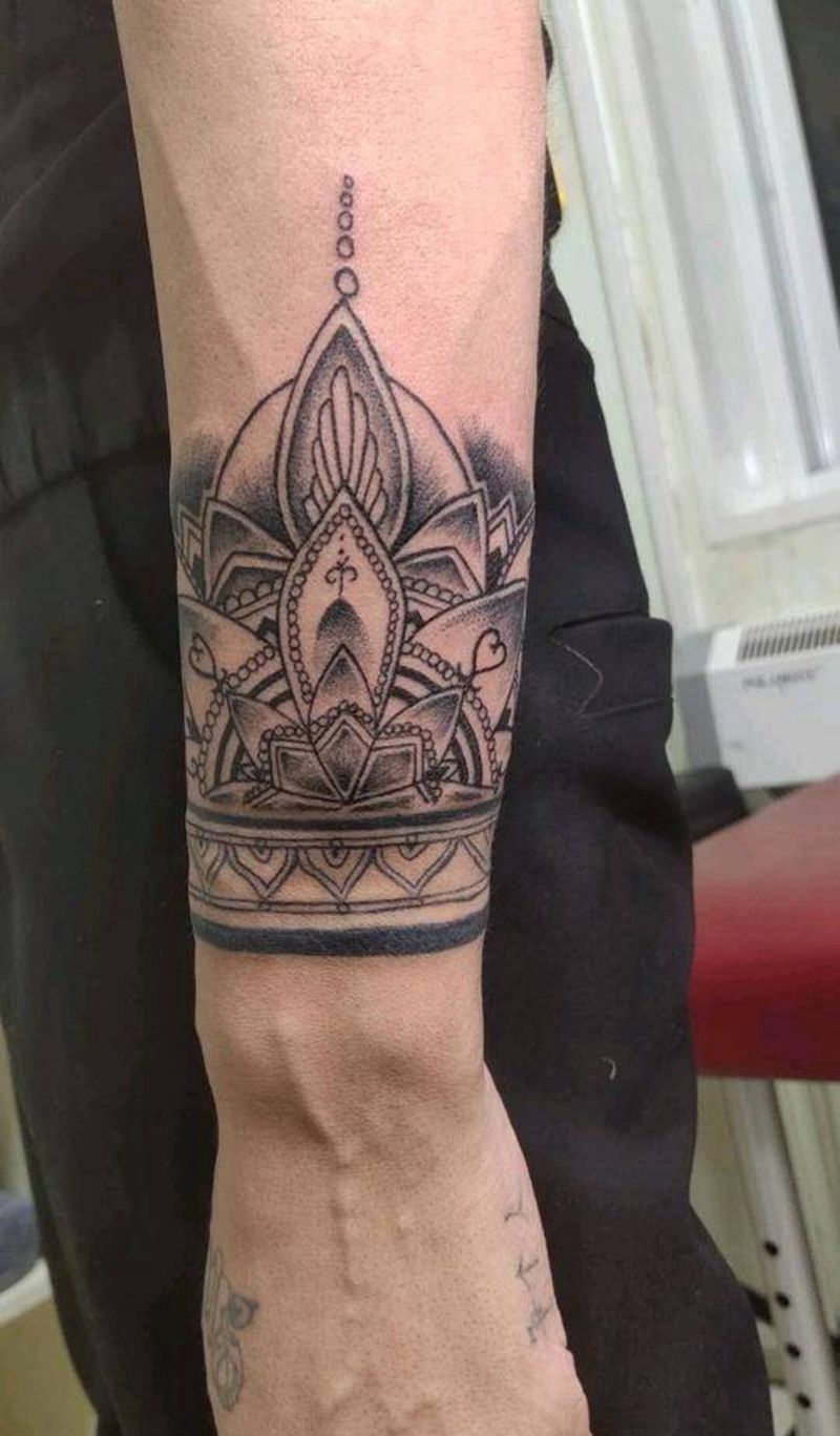 梵花纹身图片_手臂点刺纹身图案