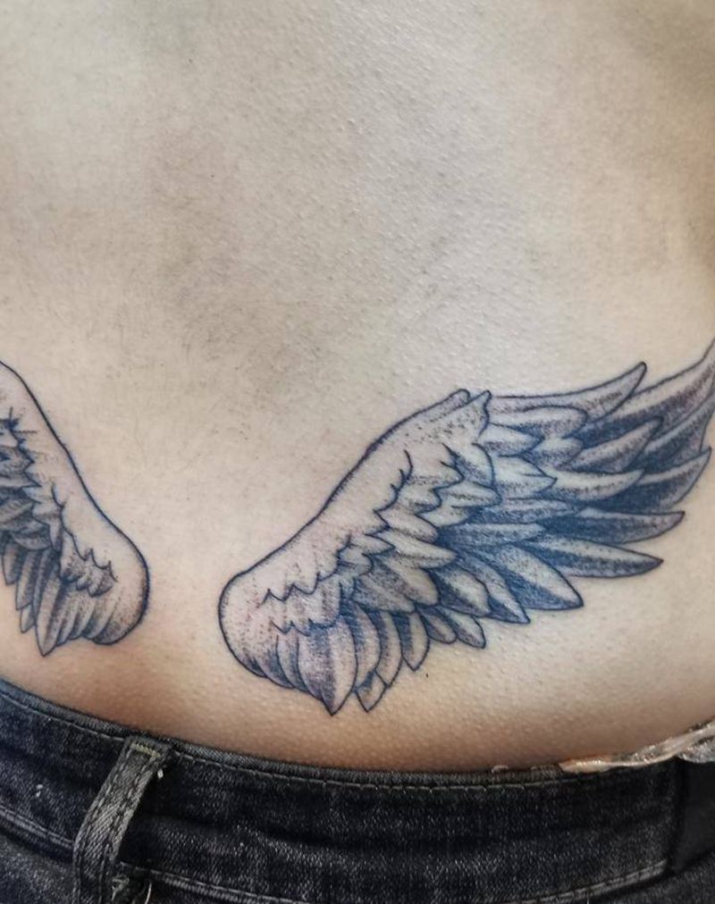 翅膀纹身图片_腹部腰部点刺纹身图案
