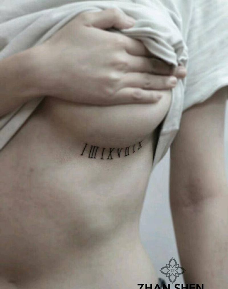 字母纹身纹身图片_臀部胸部点刺几何字母数字纹身图案