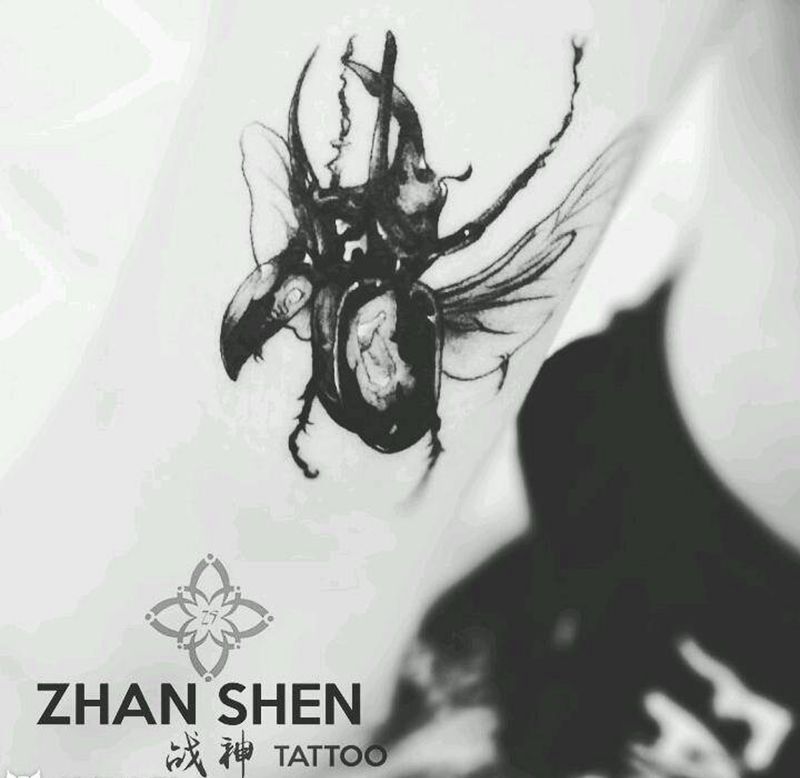 大兜虫纹身图片_胸部手臂欧美写实几何昆虫虫子甲壳虫纹身图案