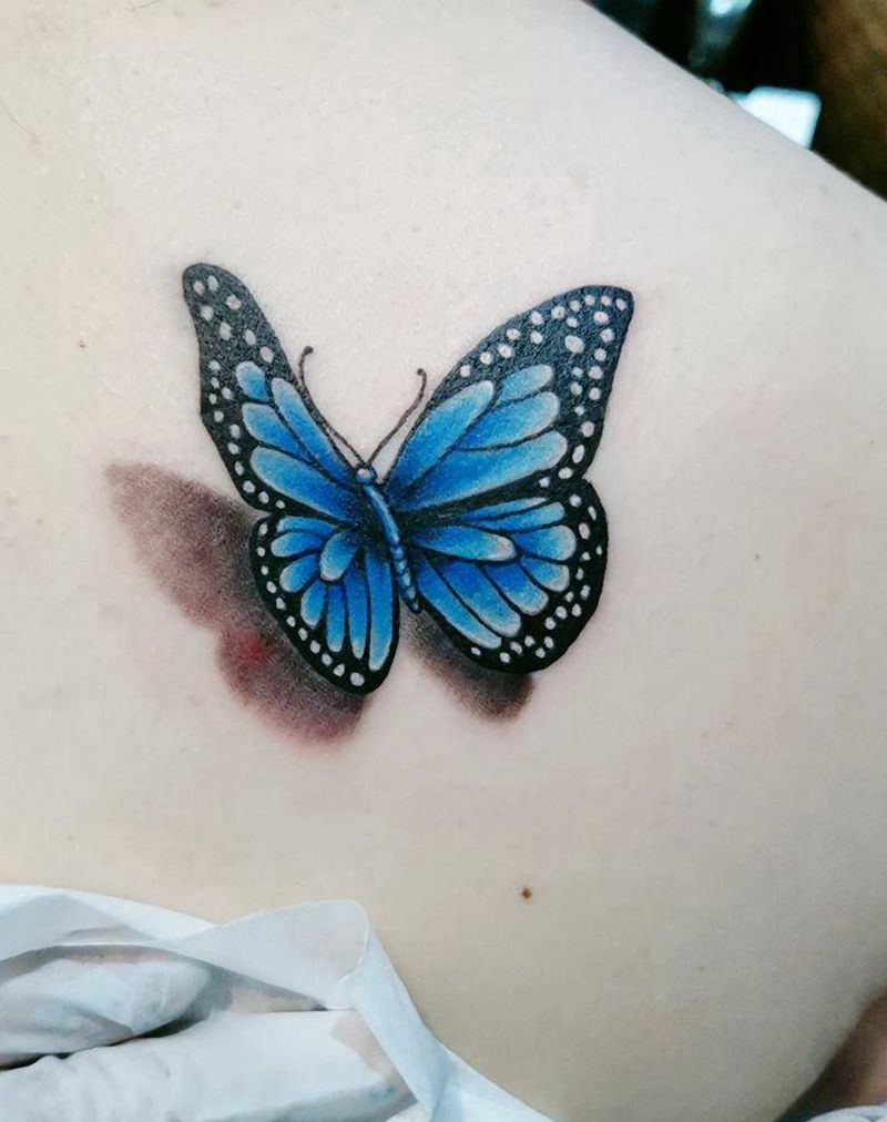 花蝴蝶纹身图片_手臂肩部欧美写实纹身图案