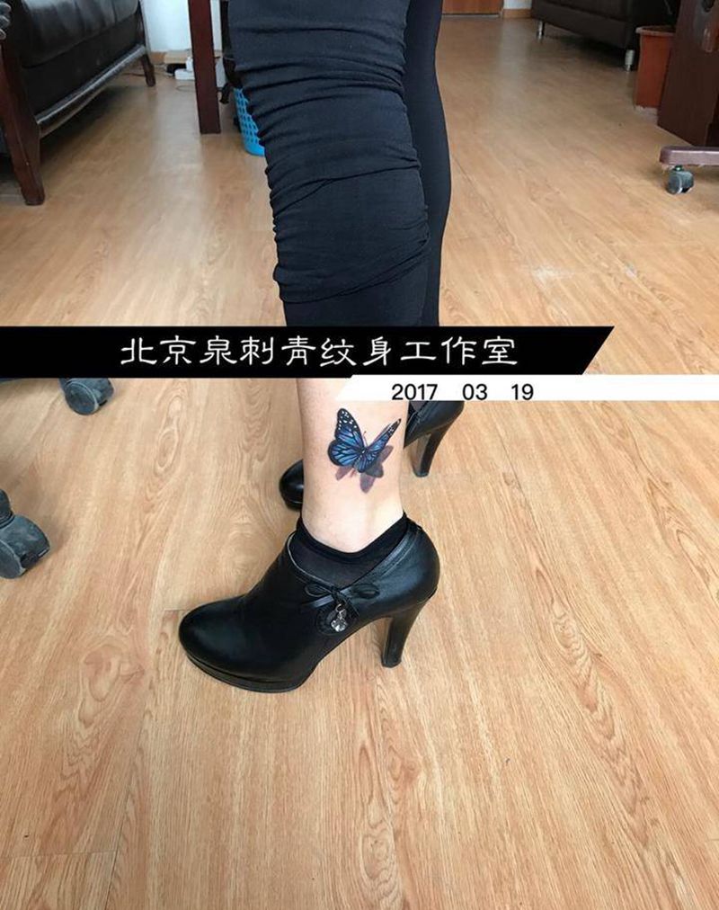 蝴蝶纹身图片_成品腿部写实清新动物纹身图案