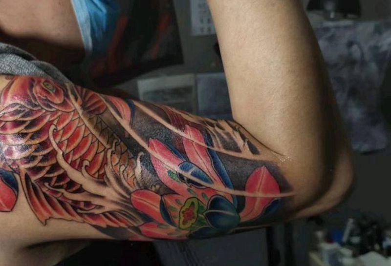 大臂纹身图片_手臂新传统纹身图案