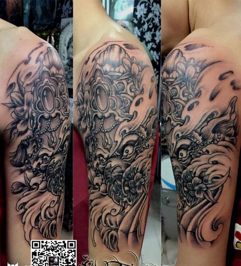 大臂象神纹身图片_手臂纹身图案