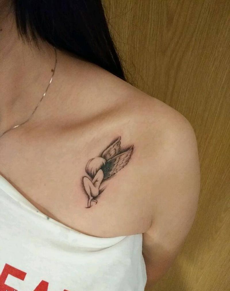 小天使纹身图片_胸部腹部手臂欧美写实人物鬼神宗教成品纹身图案