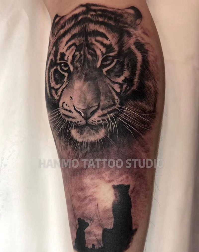 大脑斧纹身图片_腿部欧美写实纹身图案