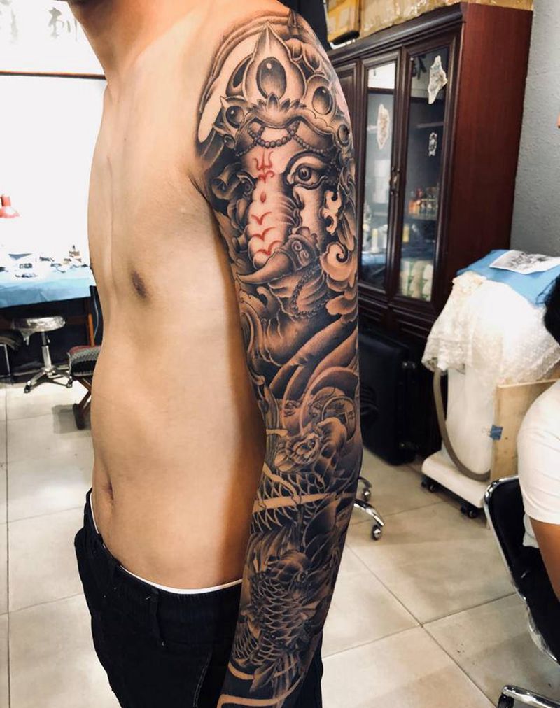 象神配鲤花臂纹身图片_手臂新传统纹身图案