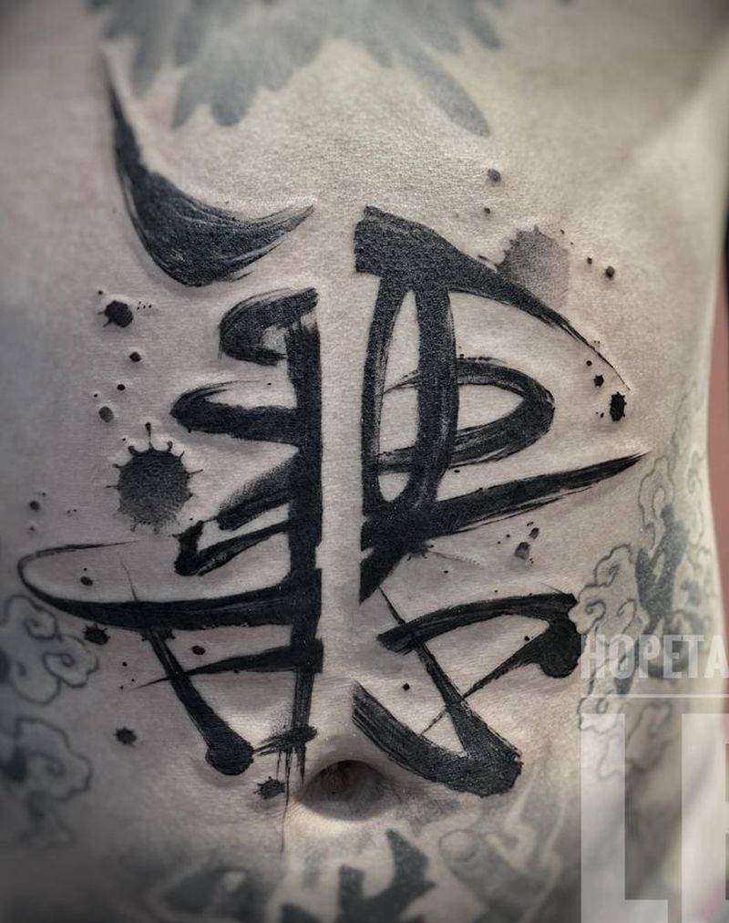 善恶纹身图片_腹部水墨纹身图案