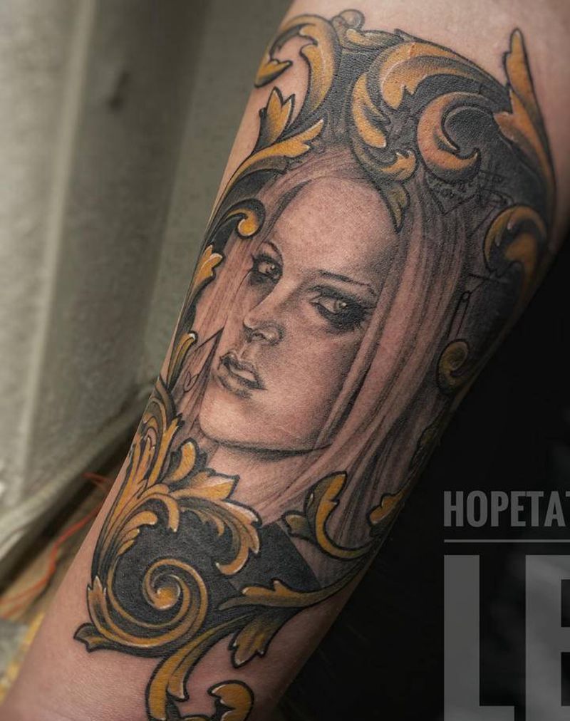 艾薇儿纹身图片_手臂欧美写实纹身图案