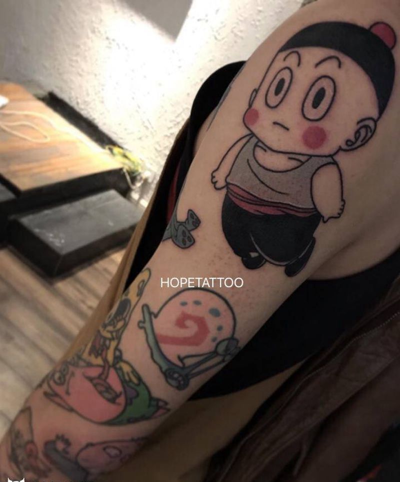 客人的童年记忆纹身图片_手臂Old SchoolNew School纹身图案