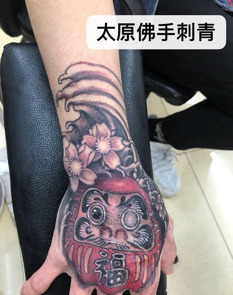 疤痕遮盖达摩蛋纹身图片_手部新传统纹身图案