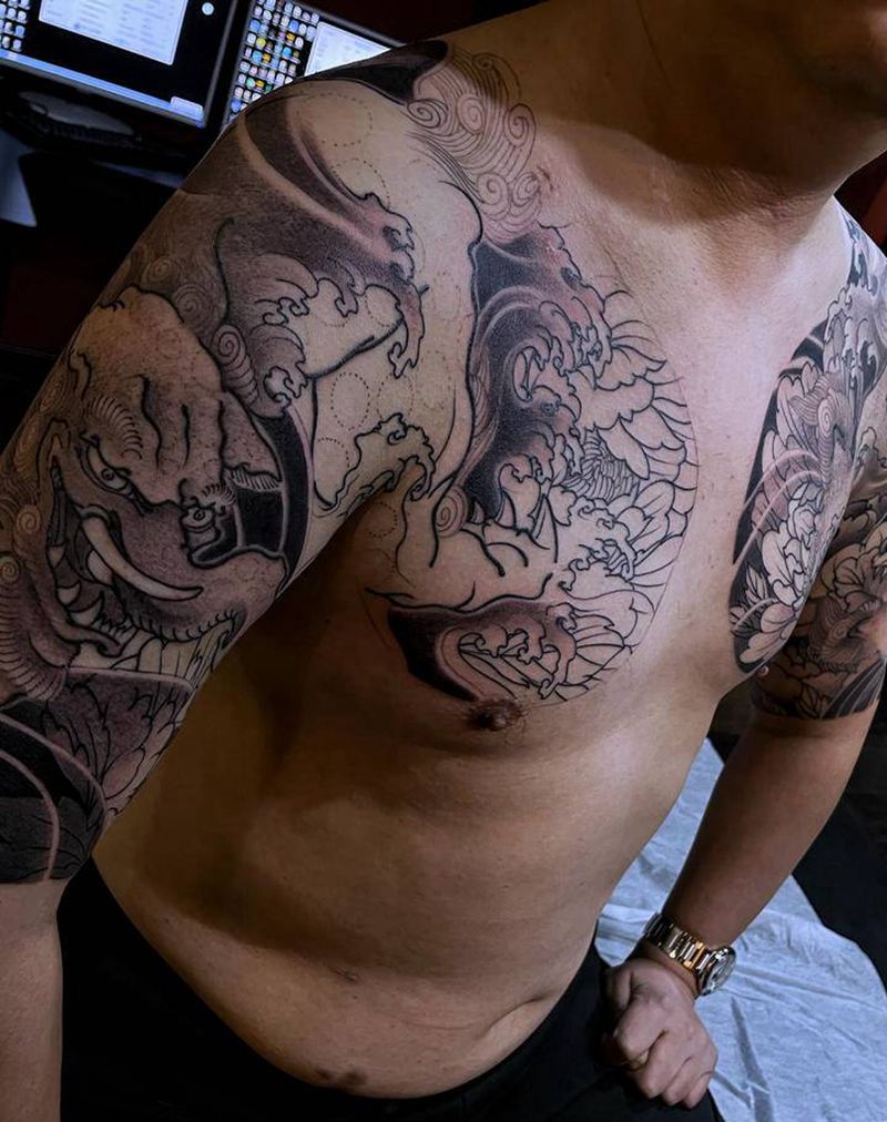 半甲未完纹身图片_胸部手臂新传统老传统纹身图案