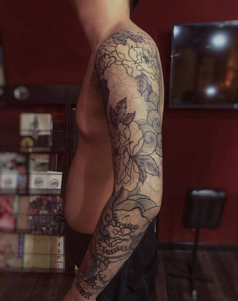 唐狮子花臂纹身图片_手臂新传统纹身图案