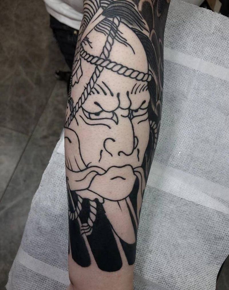 生首纹身图片_手臂纹身图案