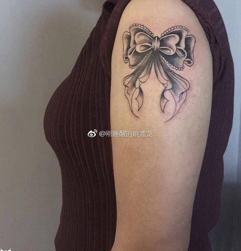 蝴蝶结。纹身图片