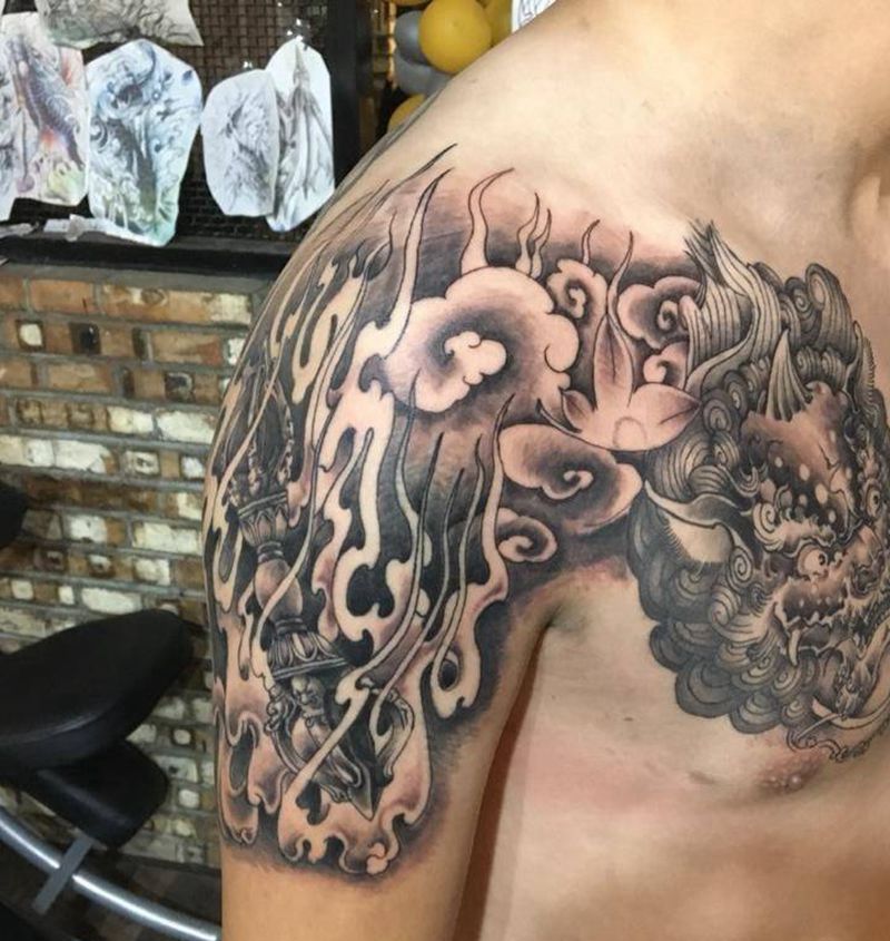 唐狮子纹身图片_胸部新传统纹身图案