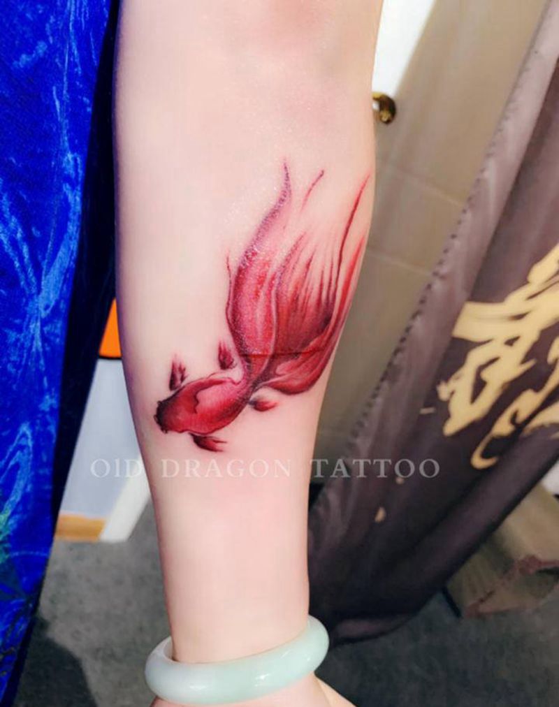 鱼纹身图片_手臂纹身图案