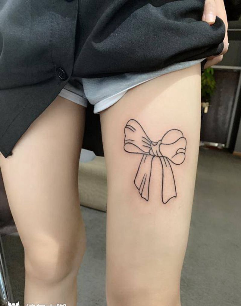 蝴蝶结纹身图片_腿部纹身图案