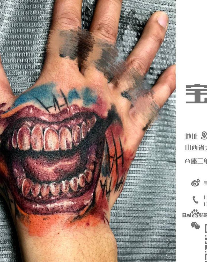 Hahaha纹身图片_手部欧美写实小丑纹身图案