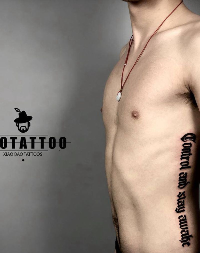 哥特风格纹身图片_腰部花体字纹身图案