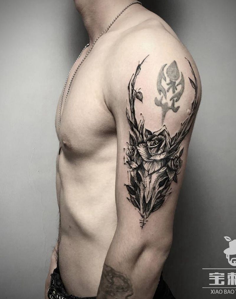 羊骨纹身图片_手臂几何点刺羊头骨骷髅纹身图案