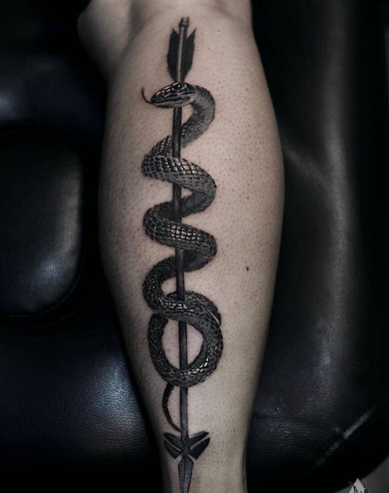 BlackMamba纹身图片_腿部欧美写实纹身图案