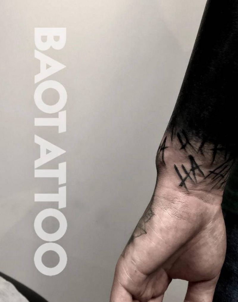 黑臂纹身图片_手臂几何纹身图案