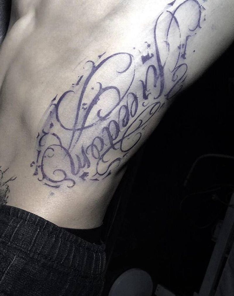 花体字纹身图片_腰部花体字纹身图案