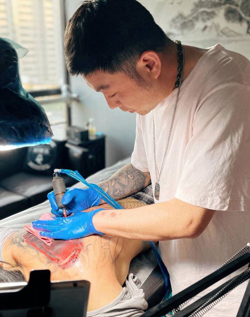 宝刺青首席工作中纹身图片_背部新传统纹身图案