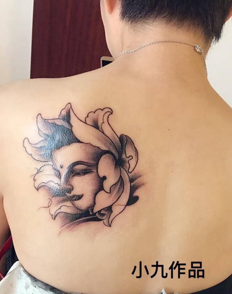 花开见佛纹身图片