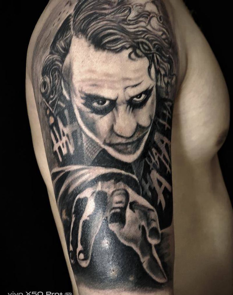 小丑纹身图片_手臂欧美写实纹身图案