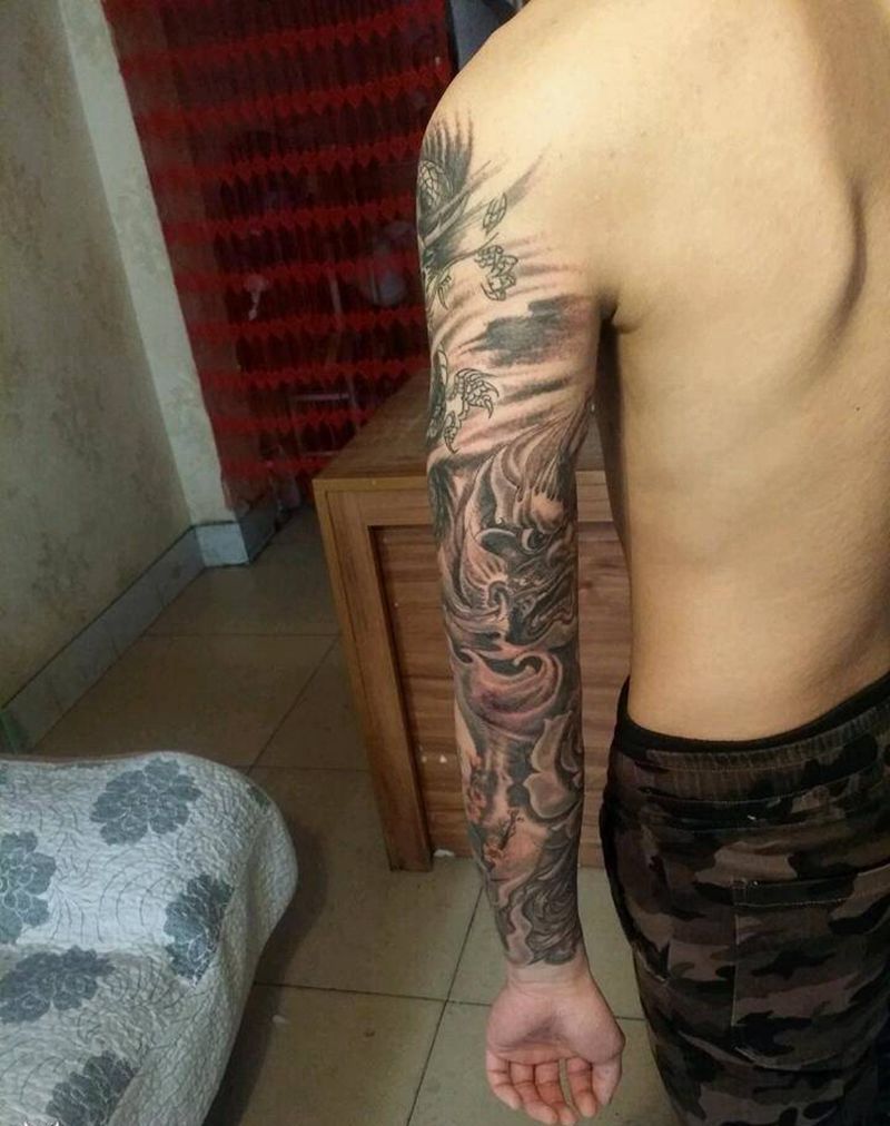 老图接花臂完成纹身图片_肩部手臂传统习俗肖像人物鬼神成品纹身图案