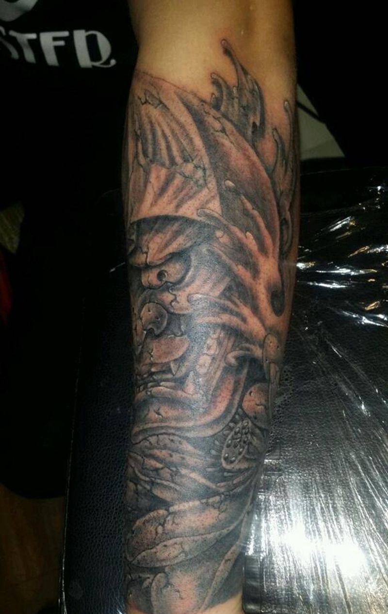 石雕班若纹身图片_手臂鬼神宗教成品纹身图案