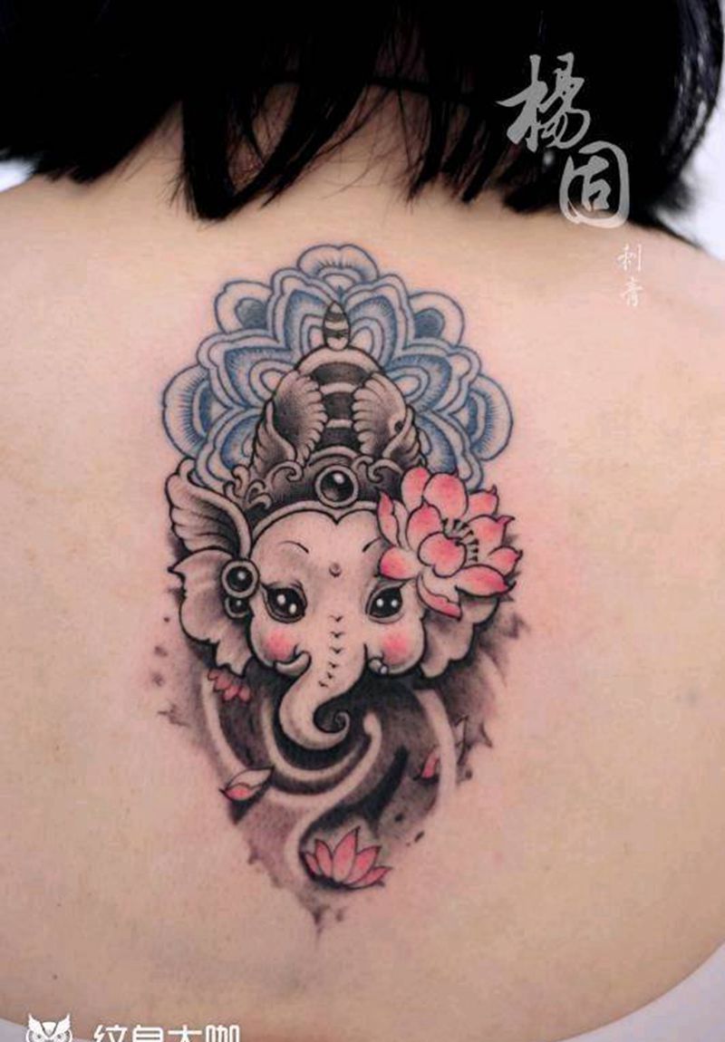 象神纹身图片_背部新传统水墨象神纹身图案