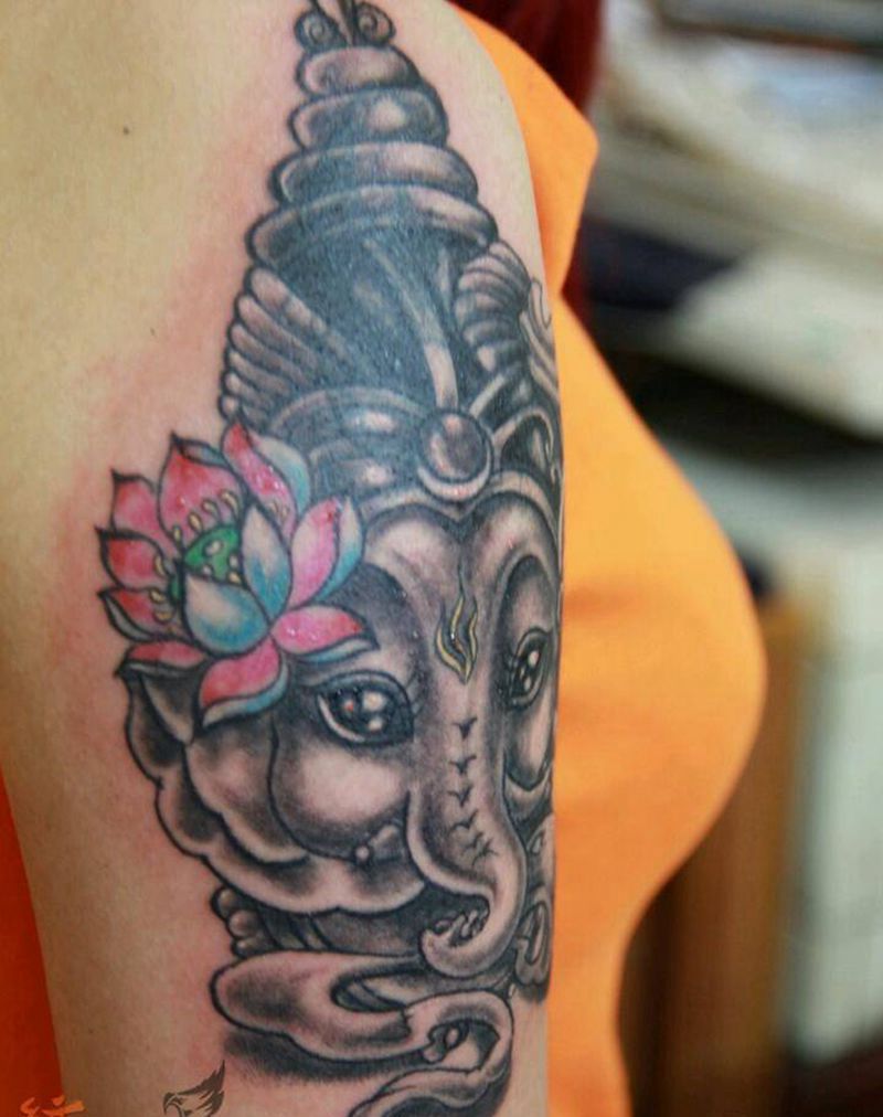 可爱的招财象神MM纹身图片_肩部手臂欧美动物鬼神纹身图案