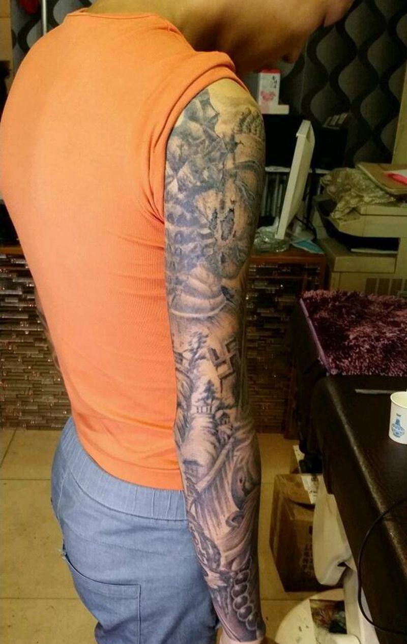 石佛花臂纹身图片_肩部手臂手部传统习俗人物静物鬼神成品纹身图案