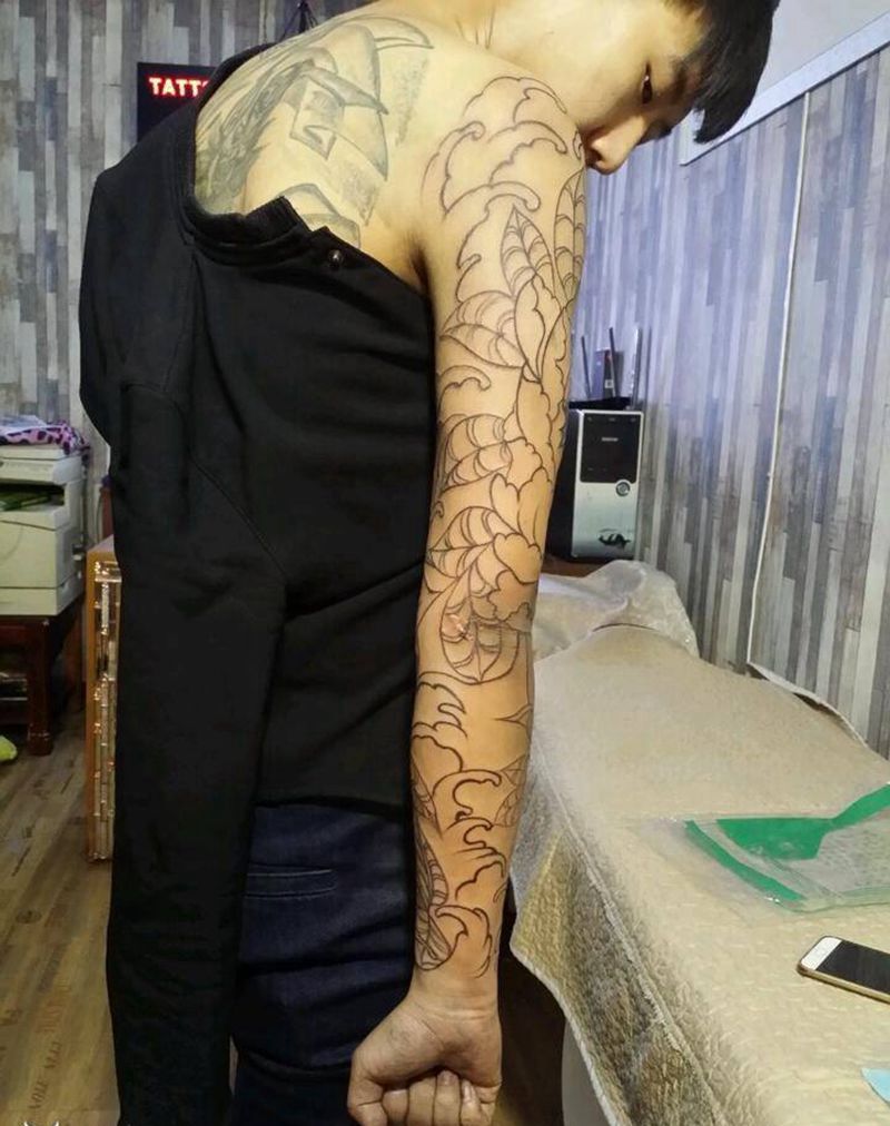 浪花牡丹花臂纹身图片_肩部手臂手部静物成品手稿纹身图案