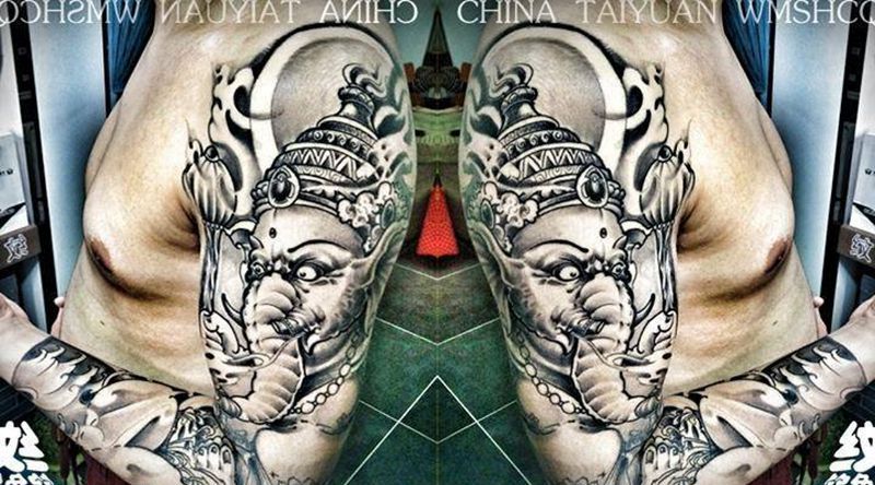 象神恢复后效果纹身图片_肩部手臂新传统象神花臂纹身图案