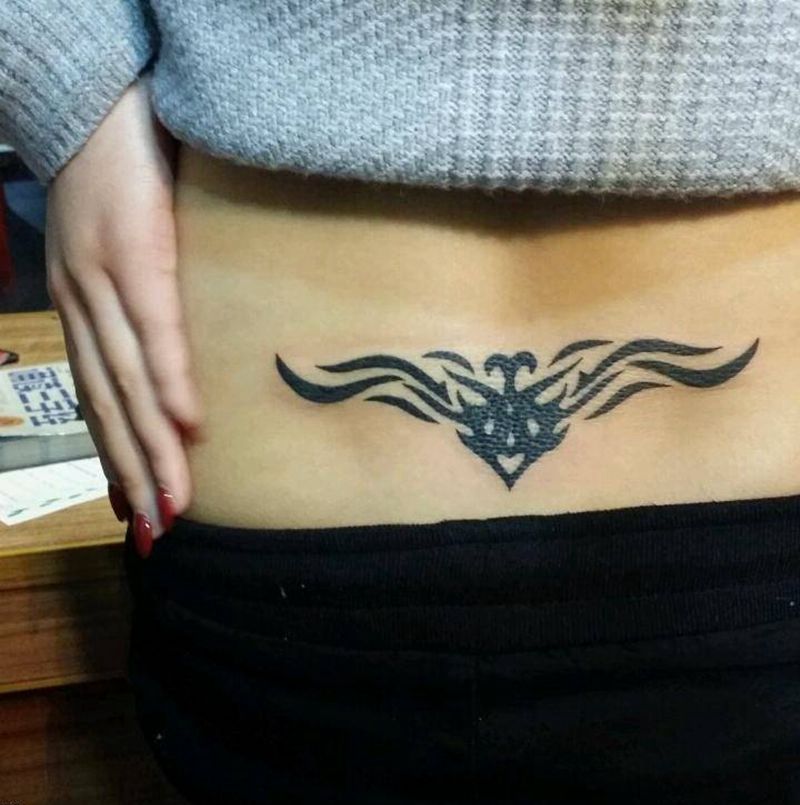 图腾腰花纹身图片_腰部欧美几何图腾成品纹身图案