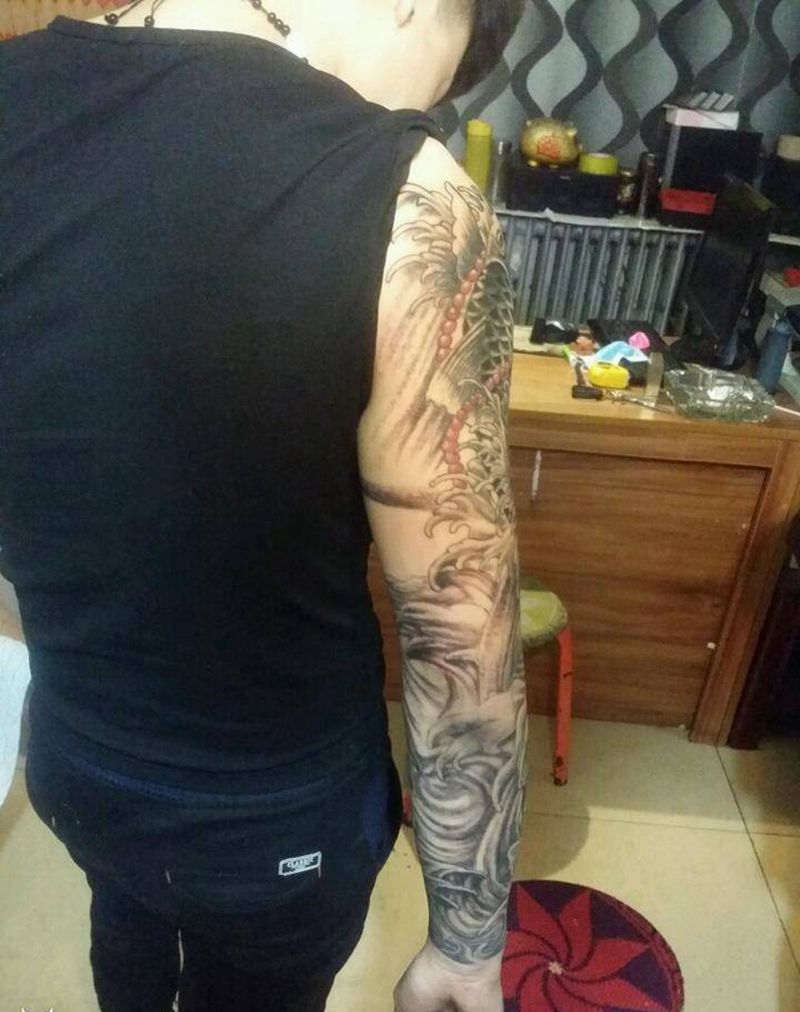 遮盖花臂纹身图片_肩部手臂手部动物成品纹身图案